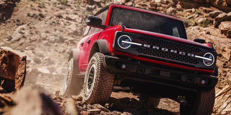 2026 Ford Bronco with Sasquatch Package traversing rocky terrain